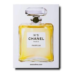 a bottle of chanel no 5 parfum on top of a white box