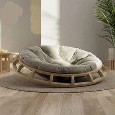 a dog bed is sitting on the floor