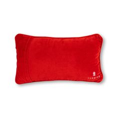 a red pillow on a white background