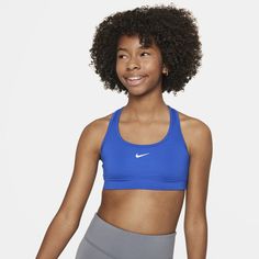 With a snug racerback design, the Nike Swoosh Sports Bra is more than just comfortable—it sends sweat packing. Our lightweight fabric moves sweat away from your body to help you stay dry, cool and focused, so you never have to sit a play out. Sports Bra Nike, Girls Sports Bras, Bra Nike, Nike Sports Bra, Nike Kids, Nike Swoosh, Lightweight Fabric, Big Kids, You Never