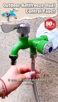 a hand holding a faucet with water coming out of it and the words outdoor antifree dual control