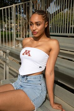 Our Bandana Top is the perfect trendy piece to complete your game day fit! Features a strapless, cropped silhouette with a ruched, elastic back and pointed bottom hem. SIZING AND DETAILS Sizing: XS-XXL Adjustable back ties 95% Cotton, 5% Spandex Heat Transfer Vinyl logo application P.S. We’d love to see you repping this style! Make sure to tag us (@hypeandvice) to be featured :) Vinyl Logo, University Of Minnesota, Transfer Vinyl, Heat Transfer Vinyl, Game Day, Heat Transfer, Minnesota