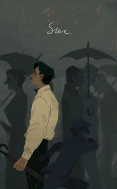 a man standing in front of a group of people holding umbrellas