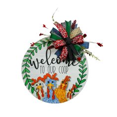 an ornament that says welcome to our coop