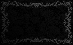 a black and white background with an ornate border