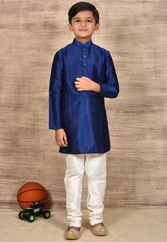 This exquisite Kids Kurta Set is specially crafted for Birthdays , Indian weddings and festivals. The set includes a beautifully self-embroidered Dopion art silk top, paired with your choice of a ready-made Dhoti, Chudidar or Patiyala bottom. Attributes 1. Top - Premium Quality Silk Fabric 2. Bottom - Ready Made Chudidar/ Doti/Patiyala 3.  Color - Turquoise/ Red/Royal Blue/ Bottle Green/ Cream Note For Perfect Fitting * Pls Check the kid's Body Chest Exact Measurement With Out Adding Any Space or Gap From Your Side Boys Wedding Dress, Wedding Dress Kids, Boys Sherwani, Ring Bearer Suit, Kids Kurta Pajama, Kids Ring, Kids Kurta, Wedding Dresses For Kids