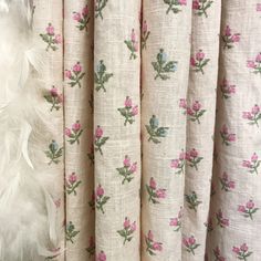 curtains with pink flowers and green leaves on them