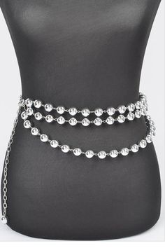 introducing our exquisite Multi-Layered Beaded Chain Belt, a fusion of PVC and metal craftsmanship for a stunning, versatile accessory. With its intricate beaded design and multi-layered construction, this belt adds an instant touch of glamour to any outfit. Measuring approximately 0.65 inches in width and 47 inches in length, it offers both style and functionality, allowing you to cinch your waist or drape it effortlessly for a statement look. Elevate your ensemble with this chic and contempora Metal Waist Chain For Festivals, Adjustable Silver Elegant Waist Chain, Chic Silver Body Chain For Party, Adjustable Silver Body Chain For Parties, Elegant Adjustable Silver Body Chain, Silver Adjustable Body Chain For Party, Elegant Metal Waist Chain For Party, Silver Round Beads Jewelry For Party, Silver Metal Jewelry For Accessorizing