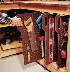 a man is working with tools in his workbench, and the caption reads expert diyverss a peg share