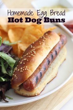 homemade egg bread hot dog buns with lettuce and potato chips on the side