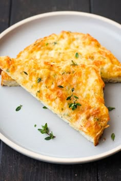 egg and cheese toasts on a white plate with text overlay that reads easy to make egg and cheese toasts