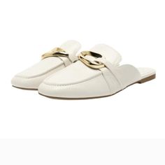 Flat Mule Loafers. Embellished Metallic Details By A Strap On The Front. Chic White Flats For Office, White Formal Flats For Summer, White Flat Loafers For Office, White Flat Office Loafers, White Slip-on Flats For Work, Elegant White Spring Flats, Trendy White Flat Loafers, Elegant White Flats For Spring, Casual White Flats For Work