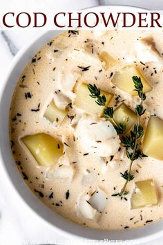 a white bowl filled with food on top of a table