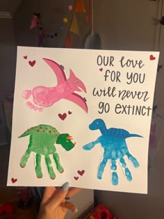 someone is holding up a sign that says, our love for you will never go extinct