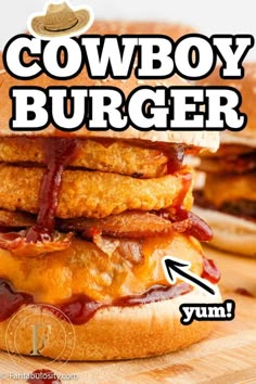 the cowboy burger has bacon on it and is ready to be eaten by someone else