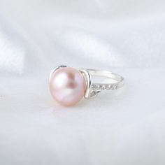 Natural Mother Of Pearl Gemstone Ring Freshwater Pearl Ring 925 Sterling Silver Ring Solid Jewelry Cubic Zircon Ring Pearl & Diamond Ring 》D E T A I L S《 ✦Gemstone : Fresh Water Pearl ✦Metal : 925 sterling silver ❣❣ Handmade Item ❣❣ 》G EM S T O N E D E T A I L《 **Gemstone structure may vary from the image as two gemstones do not have the same structure** If you want to see the picture of gemstone, then feel free to contact us. 》C U S T O M I Z E O R D E R《 All rings are made with solid 925 sterling silver and brass . If you want to make any changes in this jewelry, then please send us message. We accept custom order also. All rings are nickle free. Visit our shop : https://www.etsy.com/shop/GEMSBEDSSTORE?ref=seller-platform-mcnav Hope you love our items. Thanks Pearl Diamond Ring, Ring Pearl, Freshwater Pearl Ring, Pearl And Diamond Ring, Zircon Ring, Pearl Gemstone, Pearl Diamond, Pearl Ring, Gemstone Ring