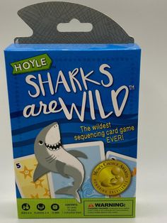 a card game box with a shark on it