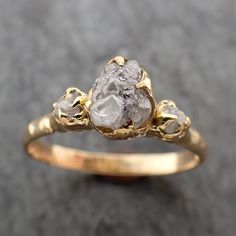 This item will be MADE TO ORDER, which can take up to 6 weeks to create a ring that looks similar to the one in the images provided. If you need the ring made sooner than the 6 weeks, we are happy to work with you to schedule a quicker delivery. This conflict-free diamond ring is a size 7 and can be resized. I created a rustic texture in the solid 18k gold with 4mm diamonds on each side. The main diamond measures about 6mm X 5.5mm. Throughout all time and history, in every tribe and culture all Pepper Rings, Raw Stone Engagement Rings, Crystal Engagement Rings, Vibrational Medicine, Wedding Ring Diamond, Raw Diamond Engagement Rings, Alternative Wedding Rings, Rough Diamond Ring, Rustic Texture