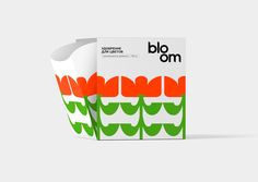 an orange and green box with the word bloom on it's side