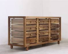 a wooden cabinet with many drawers in it