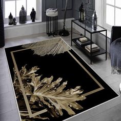 a black and gold rug with leaves on it in a living room area next to a window