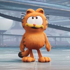 garfield the cat is standing in front of a building