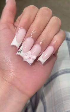 Q Initial Nails, Cute Nail Inspo Medium Length, Nail Designs With His Initial, Nails With Cursive Initial, Engagement Nails Light Pink, Pink Nails With A Initial, Acrylics With Cross Charm, Simple Nail Ideas With Rhinestones, Pink Nail With White Tip