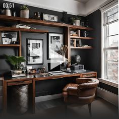 a home office with black walls and wooden shelving, leather chair, and large window