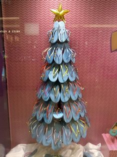 a christmas tree made out of flip flops