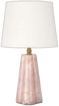 a pink lamp with a white shade on it