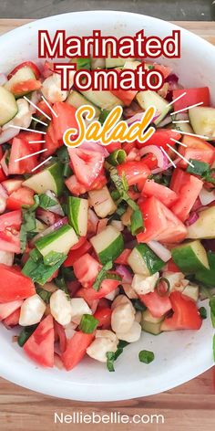 a salad with tomatoes, cucumbers and other vegetables