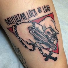 a close up of a person's arm with a tattoo on it that says, mellieuah lock and load