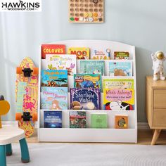 a child's bookshelf with several children's books on it in a room