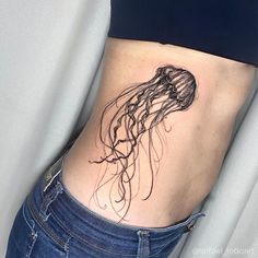 Blackwork Jellyfish Tattoo: 54 Exquisite And Detailed Jellyfish Tattoo Designs To Love #tattoo #art #jellyfish #tattooed Trend Tattoos, Rib Tattoo Placements, Tattoo Jellyfish, Secret Tattoo, Whimsical Tattoos, 16 Tattoo, Necklace Tattoo, Funky Tattoos, Jellyfish Tattoo