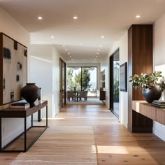 the hallway is clean and ready for guests to use it as a dining room area