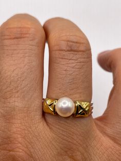 Vintage white cultured pearl  Sterling silver with gold setting   Re sizing has a $20 jeweler's fee. All rings are shipped in a nice gift box.   Check out our over a THOUSAND great reviews Engraving is $4 per letter and is not always perfect depending on the piece. It can take a few days if the jeweler is busy. This is payable to Paypal Judithsltd@gmail.com Formal Gold Rings With Akoya Pearl, Gold Pearl Ring Stamped 14k For Gift, Gold Rings With Pearl Drop For Formal Occasions, Formal Gold Pearl Rings, White Hallmarked Pearl Ring For Anniversary, Hallmarked 14k Gold Pearl Ring As Gift, Fine Jewelry Solitaire Pearl Ring, Fine Jewelry Solitaire Pearl Ring Gift, White Hallmarked Pearl Anniversary Ring