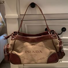 Prada Strap Bag, Designer Shoes And Bags, Bags With Keychain, Aesthetic Designer Bags, Vintage Designer Purses, Pretty Things To Buy, Unique Designer Bags, Vintage Designer Bags Aesthetic, Designer Bags 2024