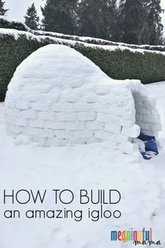 an igloo is covered in snow with the words how to build an amazing igloo