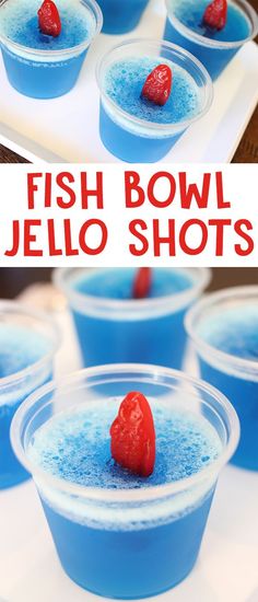 fish bowl jello shots with strawberries in the middle and blue liquid on top