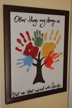 this is an image of a family tree with handprints on the front and back