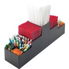 two trays filled with different types of toothbrushes on top of each other