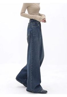 Looking for timeless high-waisted jeans? Introducing the Retro Dark Washed Jeans from DAXUEN. Balancing style and comfort. DETAILSMaterial: Cotton, PolyesterClosure Type: Zipper Fly Baggy Mid-rise Winter Bottoms, Winter Baggy Mid-rise Bottoms, Winter Straight Leg Denim Blue Bottoms, Winter Denim Blue Straight Leg Bottoms, Baggy Mid-rise Jeans For Winter, Winter Full Length Jeans With Five Pockets, Winter Full-length Jeans With Five Pockets, Winter Baggy Mid-rise Jeans, Dark Wash Wide Leg Pants For Winter