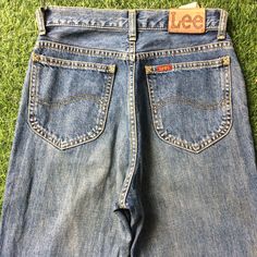 Size 25 Vintage High Waisted Lee Bootcut Jeans W25 L33, Vintage Flared Denim Pants, waist 25" Brand: Lee 100% Cotton,  Made In Japan Size On Tag: 29/32 waist measurement: 12.5 in, multiply it by 2. (waist 25") Follow our guide, Please compare the measurements with your garment. Waist 25" Rise 11.25" Thighs 22.5" Hips 38.5" Inseam 33.25" Length 44" Knee 16" Leg opening 17.5" All measurements are taken with the garment laying flat & doubled. Measurement in inches. Front rise, hip, and thigh measur Retro Red Wide Leg Jeans, Red High Rise Vintage Bottoms, Vintage Red Wide Leg Jeans, Vintage High Rise Red Bottoms, Vintage Wide Leg Red Jeans, Vintage Mid-rise Bottoms With Five Pockets, Red Retro Denim Bottoms, Vintage Red Denim Bottoms, Vintage Red Wide-leg Jeans