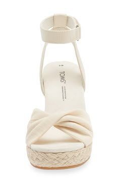 An espadrille-style platform wedge brings earthy texture and stylish height to a warm-weather sandal finished with a twisted toe strap. 3 1/2" heel; 3/4" platform (size 8.5)   3 1/2" strap height   Adjustable ankle strap with hook-and-loop closure   OrthoLite® Eco LT Hybrid insole   TOMS gives a minimum of one-third of its annual net profits to support grassroots efforts, partnering with organizations that boost mental health, increase access to opportunity and end gun violence   TOMS is a Certi Costal Grandma Shoes, Cute Fancy Shoes, Cute Wedge Heels, Cute Beach Shoes, Fancy Shoes For Women, Beachy Shoes, Hawaii Shoes, Cute Wedges Shoes, Beach Heels