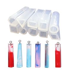 six different colored plastic containers with handles and clips on each side, all lined up in the same row