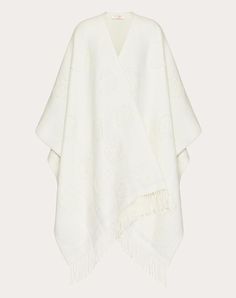 Valentino Flower poncho in wool blend with lurex details -Composition: 79% virgin wool, 14% polyamide, 3% viscose, 2% metallic fibre, 2% cashmere -Dimensions: 140 x 160 cm / 55.1 x 63.0 in. -Dry clean -Made in Italy Elegant Oversized Wool Poncho, Elegant Wool Poncho Shawl, Elegant Wool Shawl Poncho, Luxury Cashmere Shawl For Winter, Luxury Winter Poncho, Lurex Sweater, Cashmere Poncho, Latest Sweater, Metallic Sweater