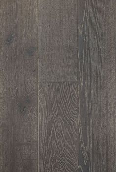 an image of wood flooring that looks like it has been painted in dark brown