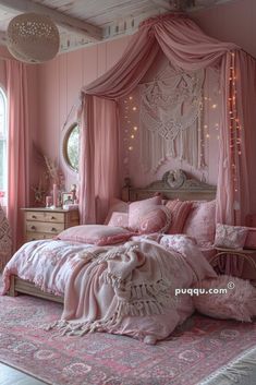 a bedroom with pink bedding and curtains