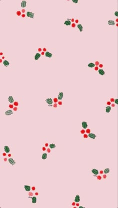 a pink background with red berries and green leaves