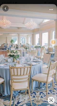 an image of a dining room setting with blue and white decor